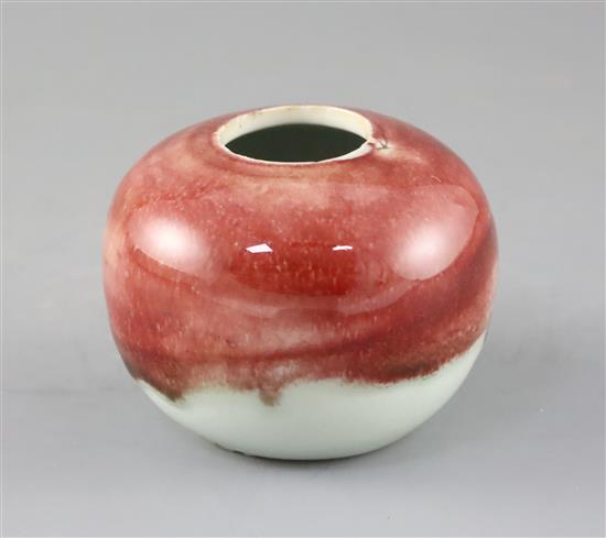 A Chinese copper red and white glazed globular water pot, 18th / 19th century, H.7cm Diam.9cm, firing crack to rim